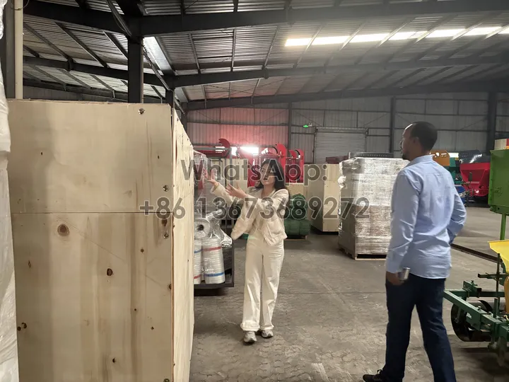 round baler wrapper in wooden crate