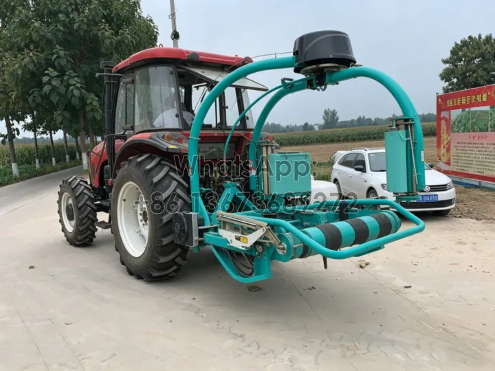 automatic silage wrapper for round bales